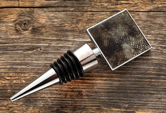 Wine bottle stopper decorated with fish leather