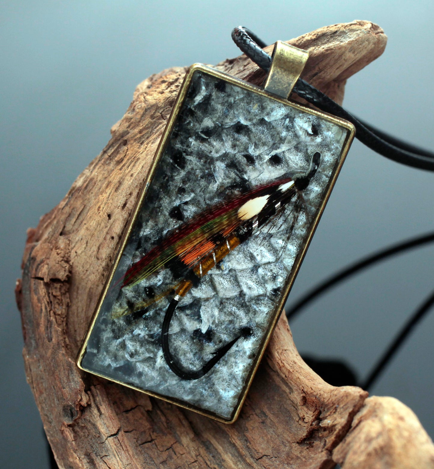 Salmon pendant with fly